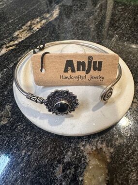 Anju Handcrafted Silver-Tone Bracelet with Black Stone Floral Accent